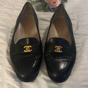 CHANEL Black Moccasins with Gold Logo